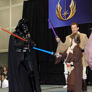 Darth Vader vs. Jedi Padawans at the Jedi Academy.  
Notice the Jedi's one-handed "non-chalant" style of holding the lightsaber! :D