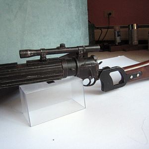 My blaster.
Hand-carved walnut gunstock