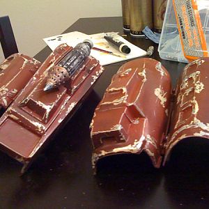 Gauntlets paint job.
WHat I like to call the "extremely weathered" look.