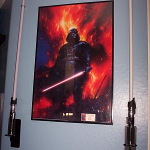 This is actually the entry wall to the loft. Both lightsabers are Vaders, and light up when turned on. One of my favorite Pics of Vader.