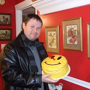 George, my husband, and his Watchmen cake I made him for his birthday.