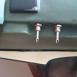 I replaced the cheap resin toggle switches with REAL ones.
